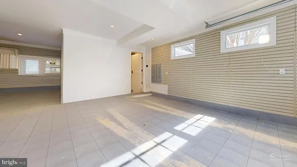 a view of room with stairs and a window