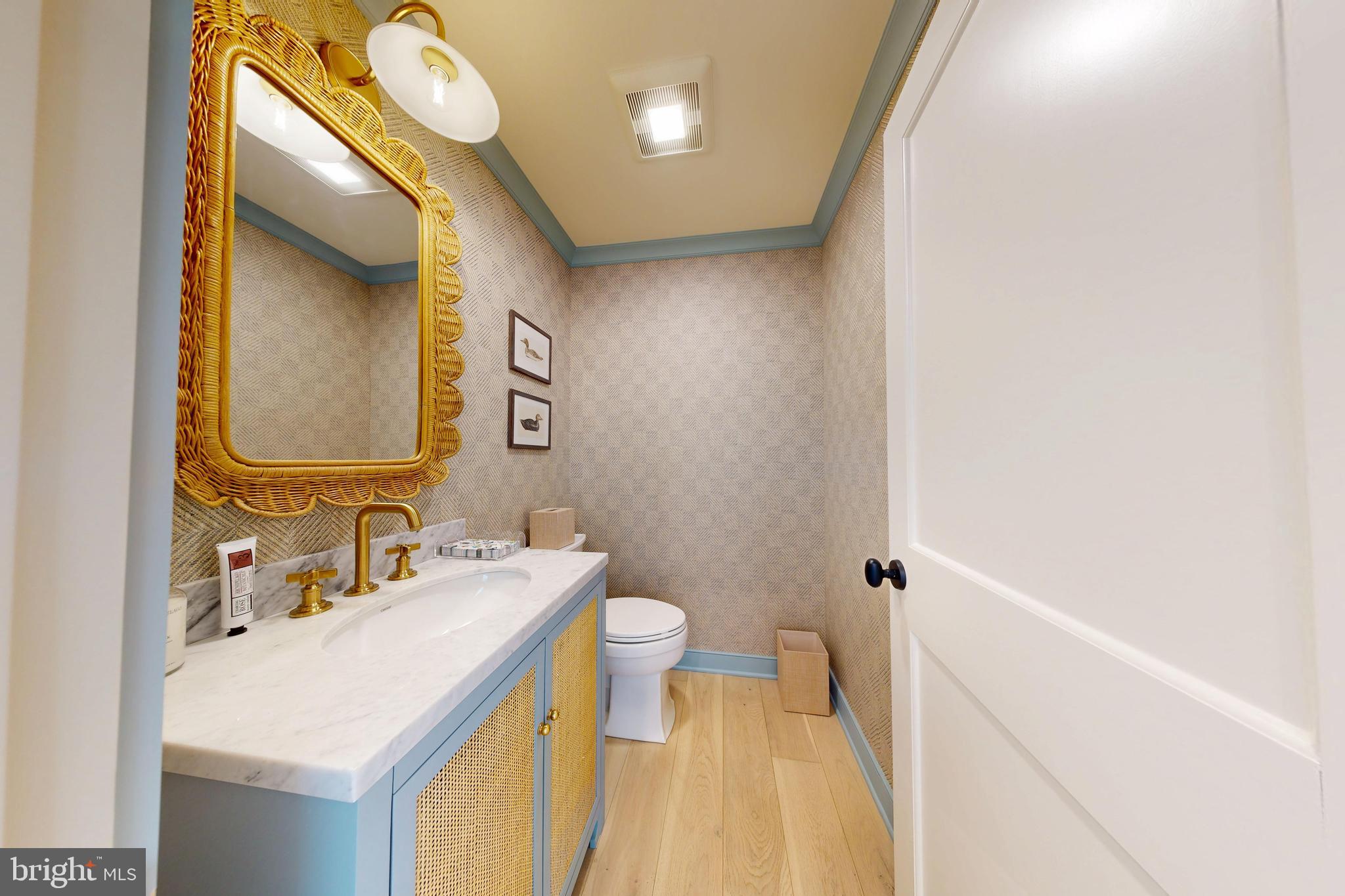 601 Cove Road St. Michaels, MD 21663 - Photo 8 of 39 a bathroom with a sink and a mirror