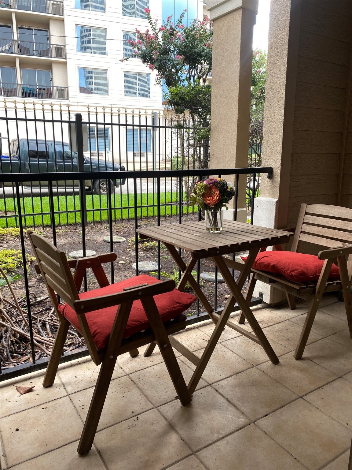 3231 Allen Parkway, Unit 2107 Houston, TX 77019 - Photo 18 of 48 a view of a chairs and table in the balcony