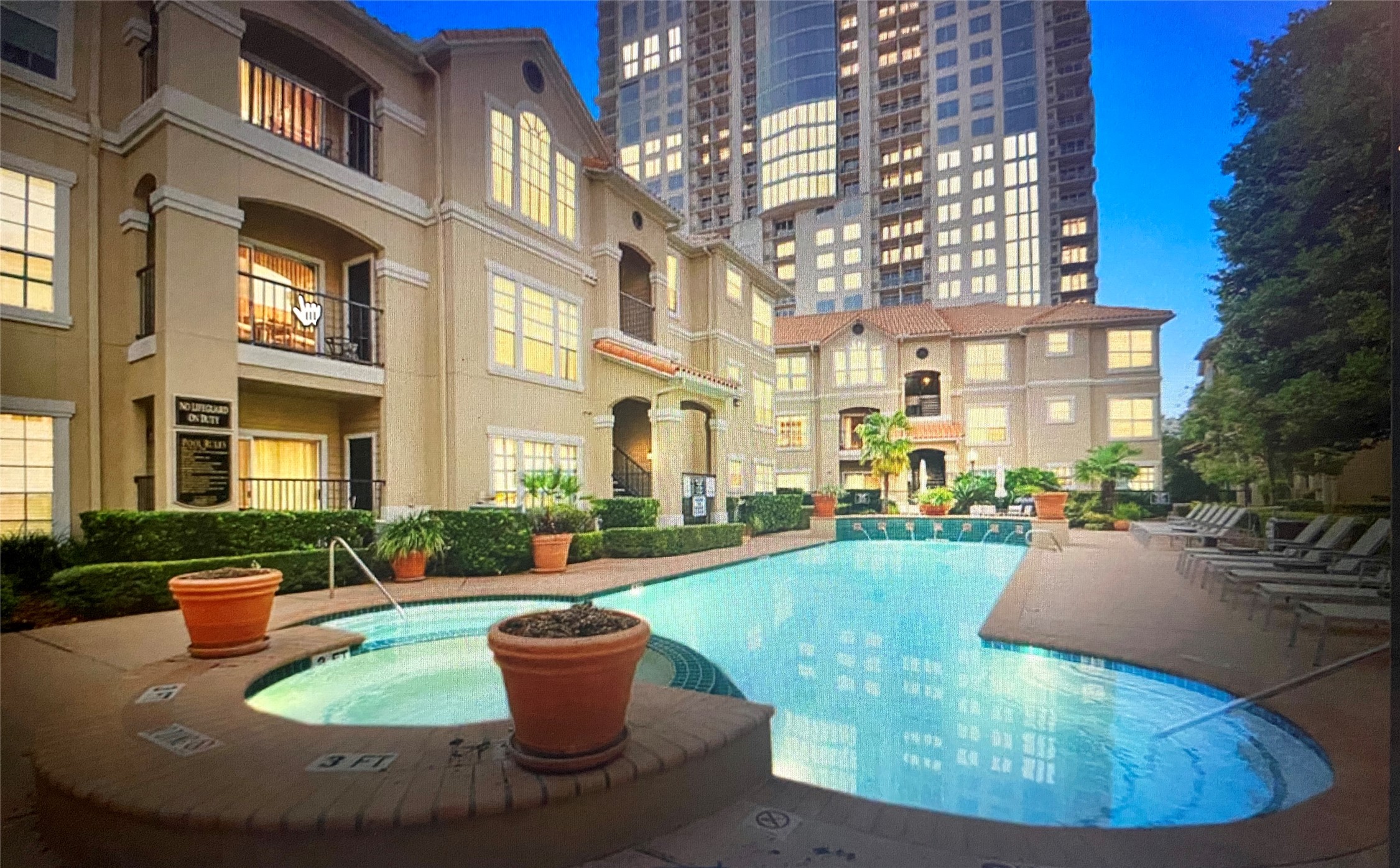 3231 Allen Parkway, Unit 2107 Houston, TX 77019 - Photo 2 of 48 a view of a patio with couches chairs dining table and chairs
