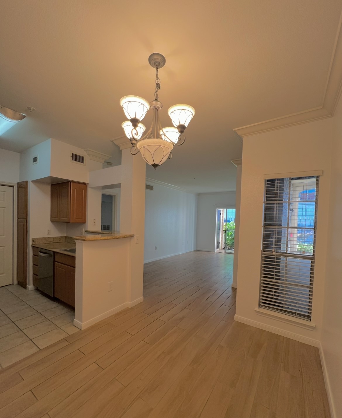 3231 Allen Parkway, Unit 2107 Houston, TX 77019 - Photo 26 of 48 a view of a kitchen with a sink and dishwasher kitchen view