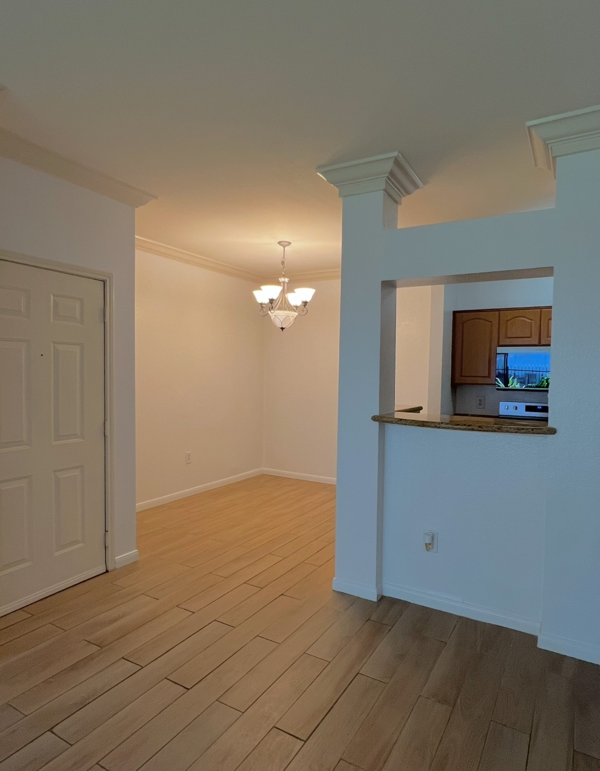 3231 Allen Parkway, Unit 2107 Houston, TX 77019 - Photo 37 of 48 a view of a room with a flat tv screen and dresser