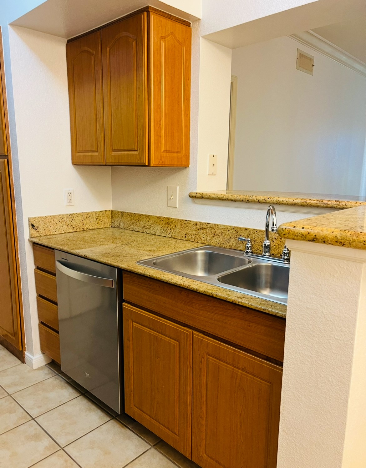 3231 Allen Parkway, Unit 2107 Houston, TX 77019 - Photo 47 of 48 a utility room with stainless steel appliances granite countertop a sink and a cabinets