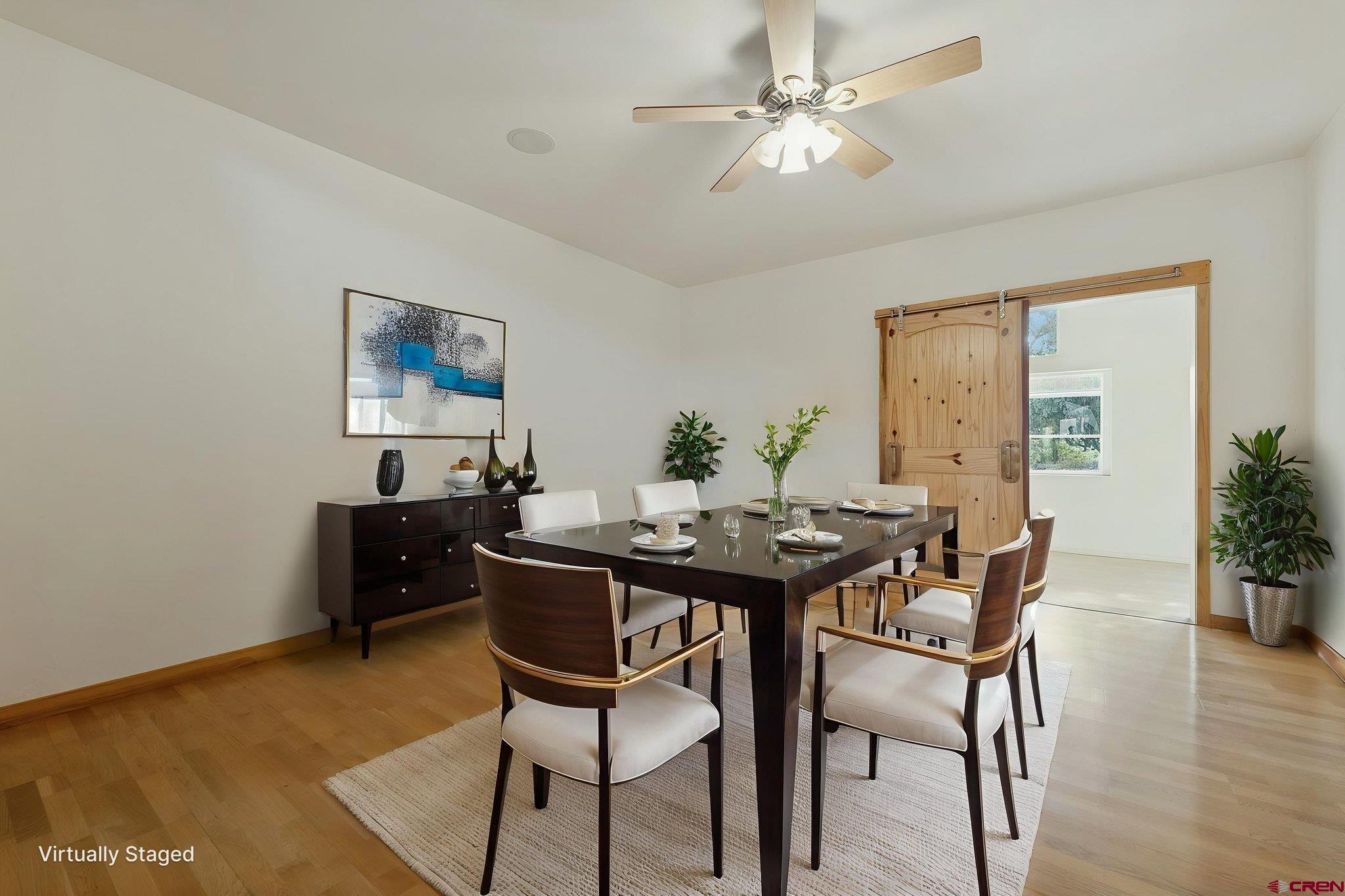 481 Far View Road Durango, CO 81303 - Photo 21 of 45 a view of a dining room with furniture and wooden floor