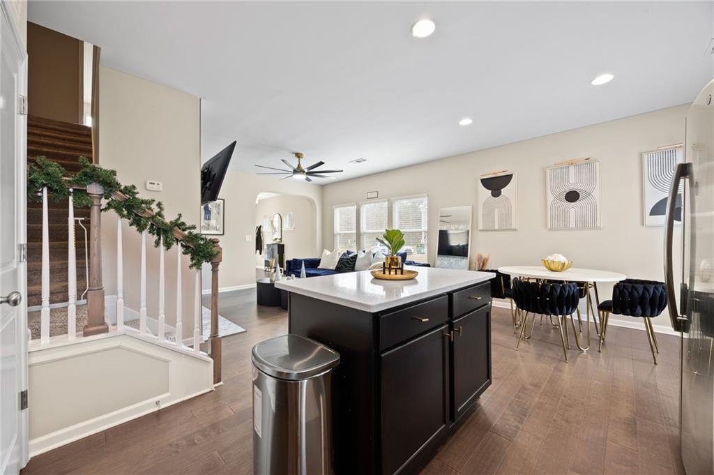5011 Longview Walk Decatur, GA 30035 - Photo 12 of 26 a kitchen with a sink and living room view