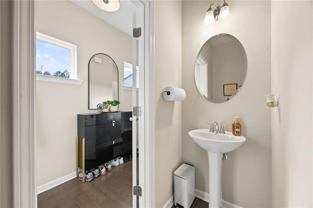 5011 Longview Walk Decatur, GA 30035 - Photo 15 of 26 a bathroom with a sink and mirror