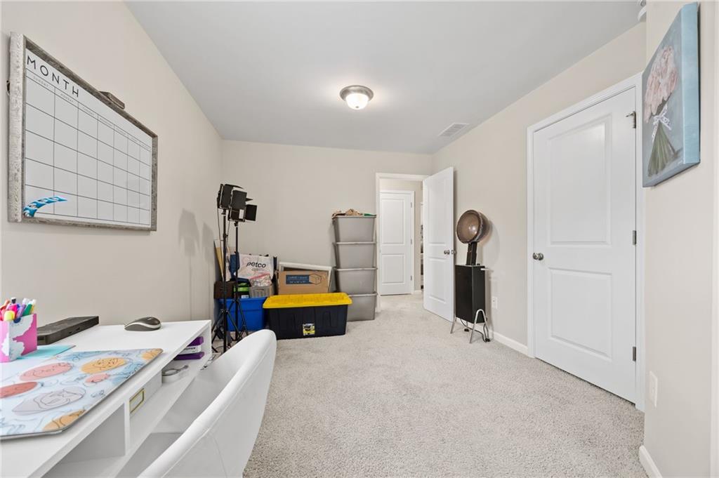 5011 Longview Walk Decatur, GA 30035 - Photo 23 of 26 a view of a room with gym equipment