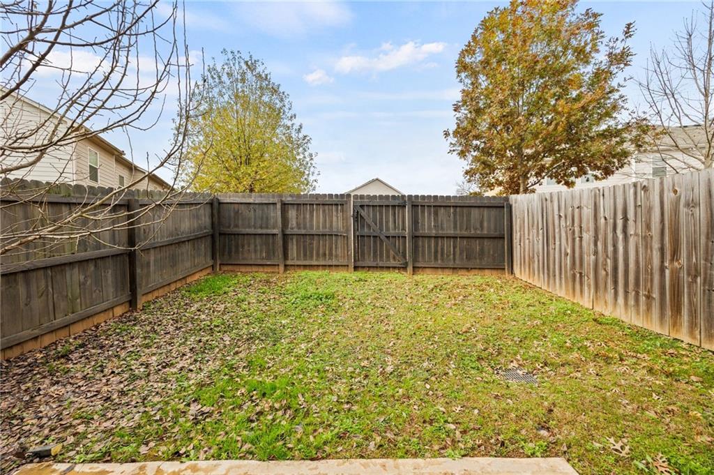 5011 Longview Walk Decatur, GA 30035 - Photo 25 of 26 a view of backyard with wooden fence