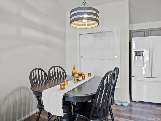 a kitchen with cabinets appliances and a sink