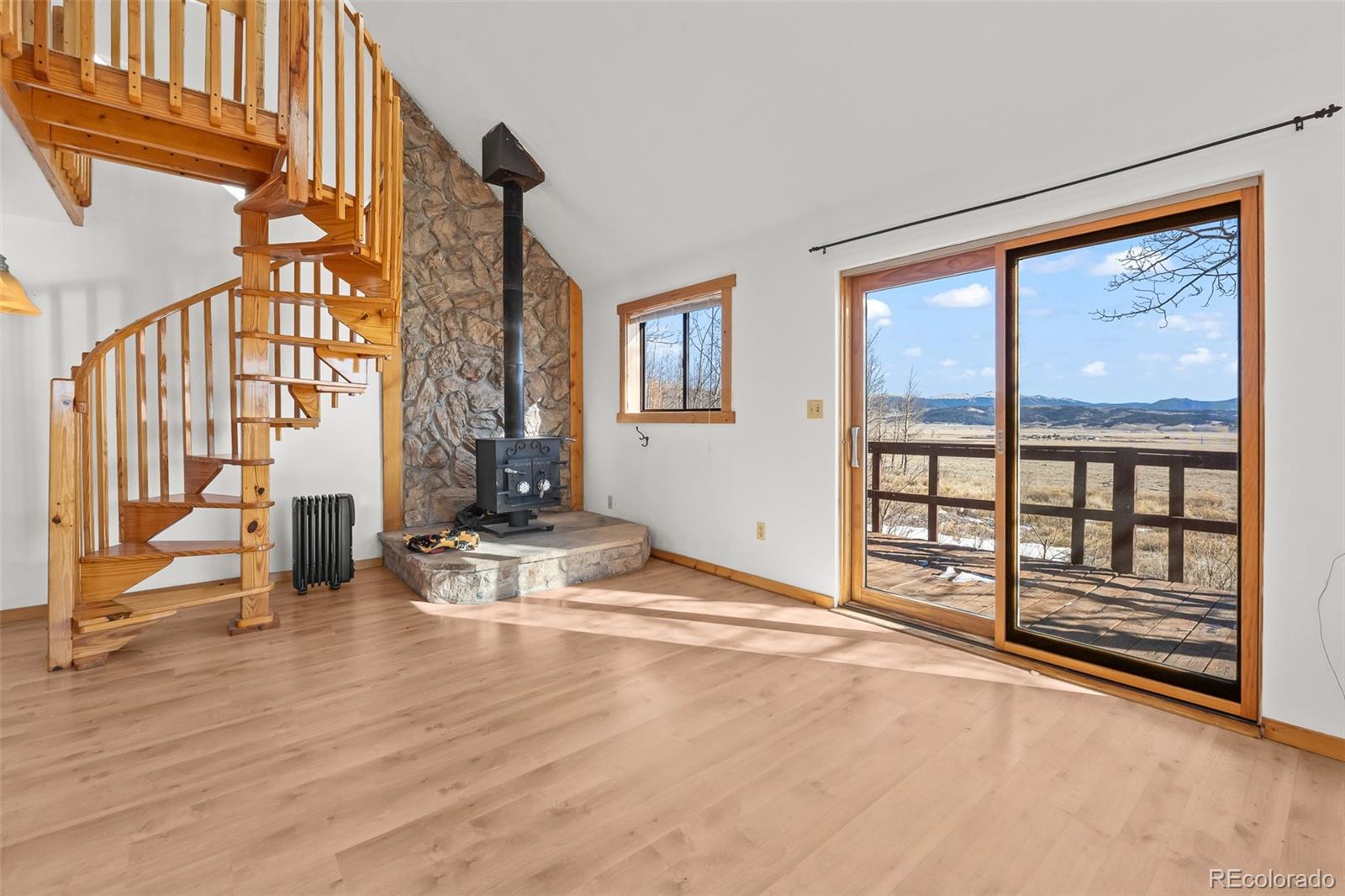 1793 Michigan Hill Road Jefferson, CO 80456 - Photo 14 of 44 a view of a livingroom with furniture and staircase