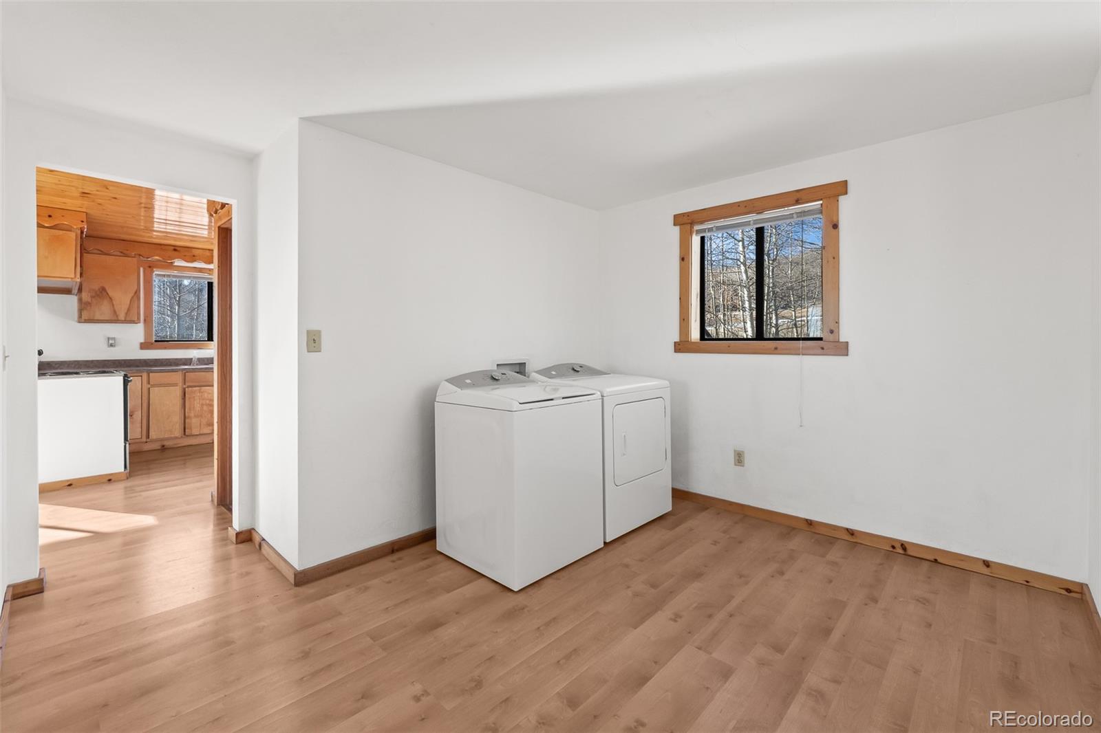 1793 Michigan Hill Road Jefferson, CO 80456 - Photo 24 of 44 a view of utility room with washer and dryer