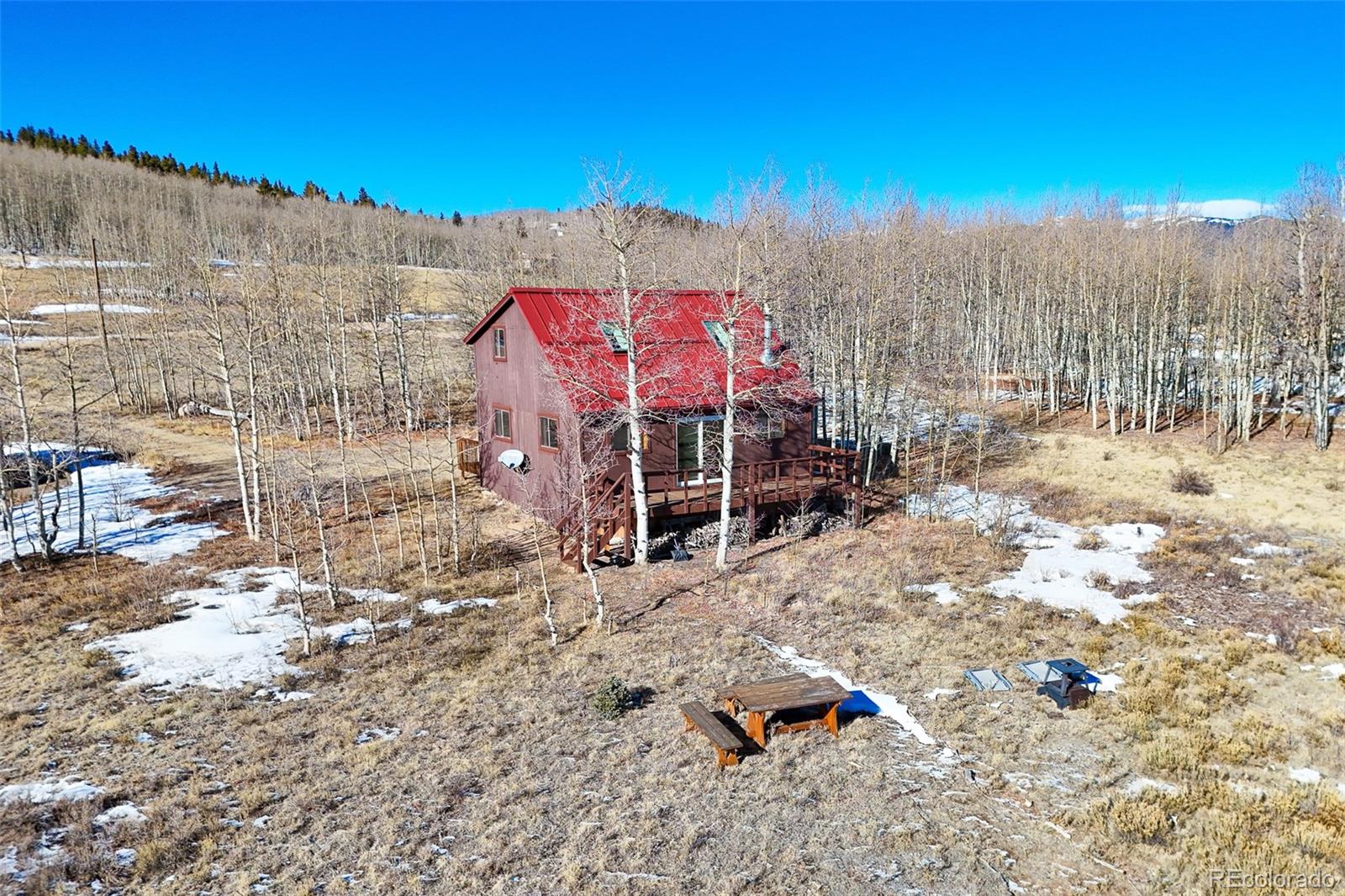 1793 Michigan Hill Road Jefferson, CO 80456 - Photo 36 of 44 a view of a terrace with a yard