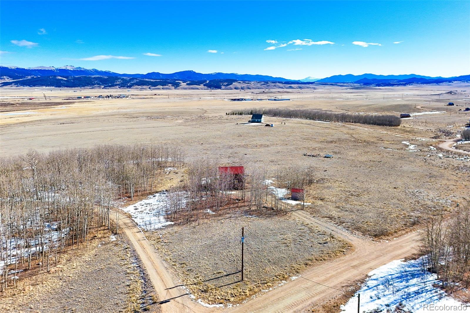 1793 Michigan Hill Road Jefferson, CO 80456 - Photo 44 of 44 a view of a lake with a mountain