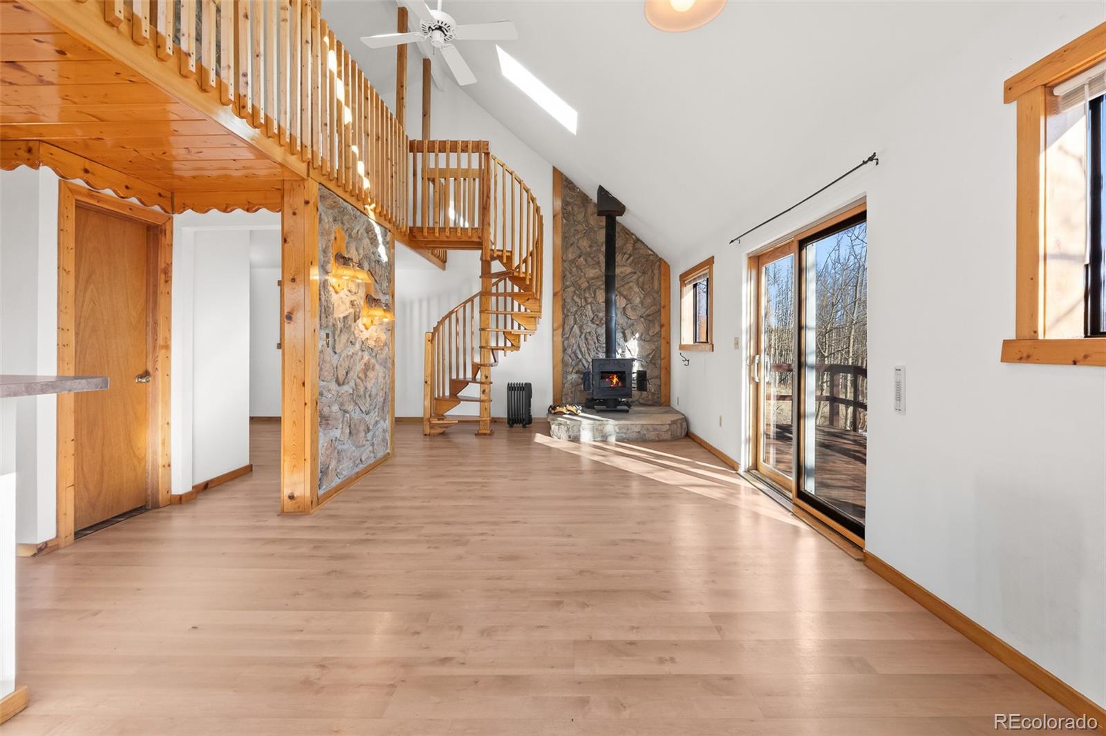 1793 Michigan Hill Road Jefferson, CO 80456 - Photo 7 of 44 a view of an entryway with wooden floor