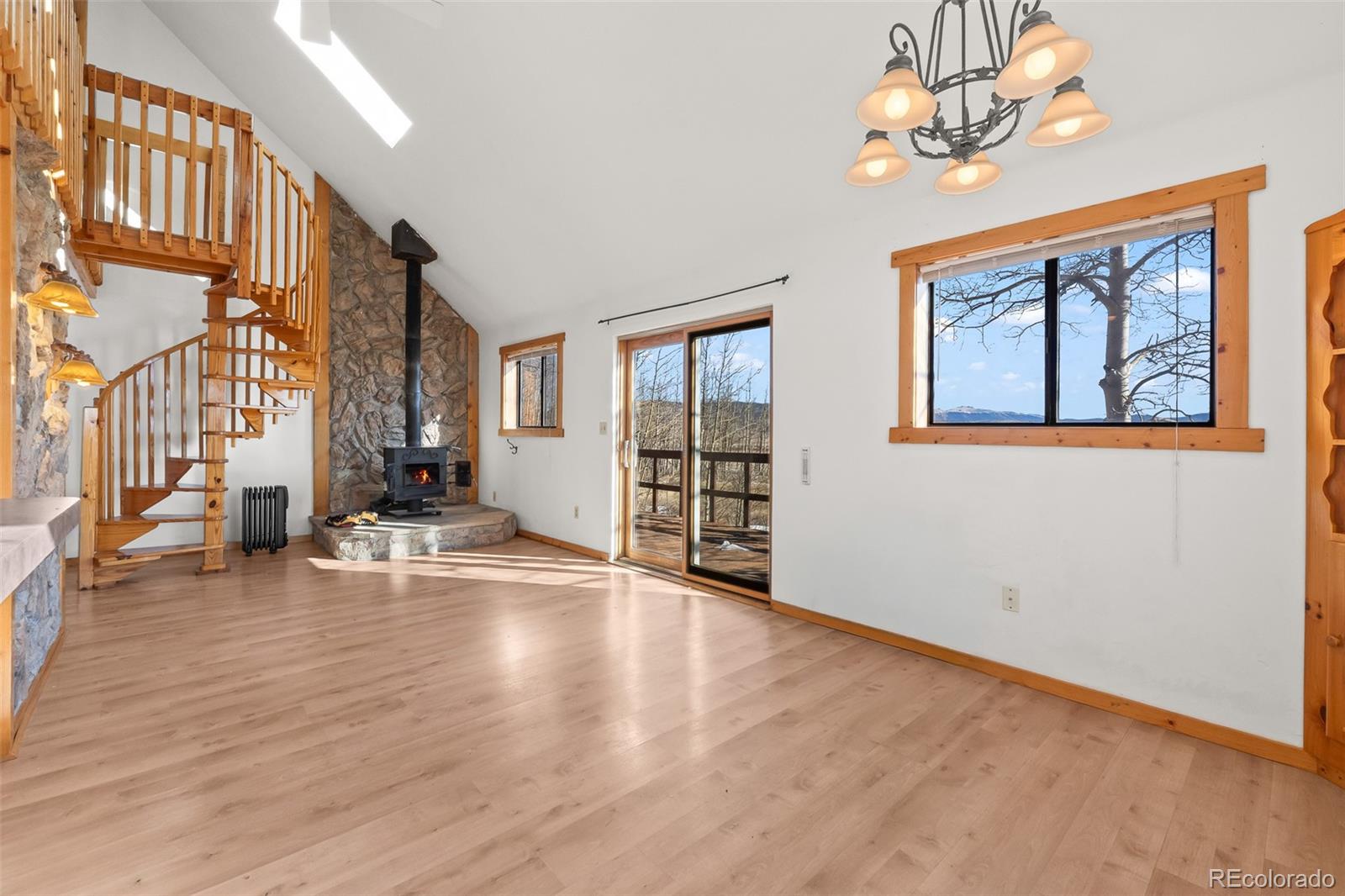 1793 Michigan Hill Road Jefferson, CO 80456 - Photo 9 of 44 a view of an empty room with a window