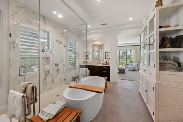 a kitchen with cabinets appliances a sink and a counter top space