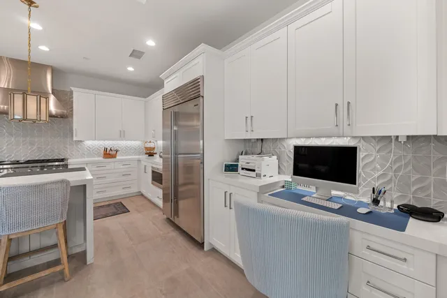 a bathroom with a sink toilet and mirror