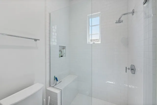 a view of a room with toys and wooden floor