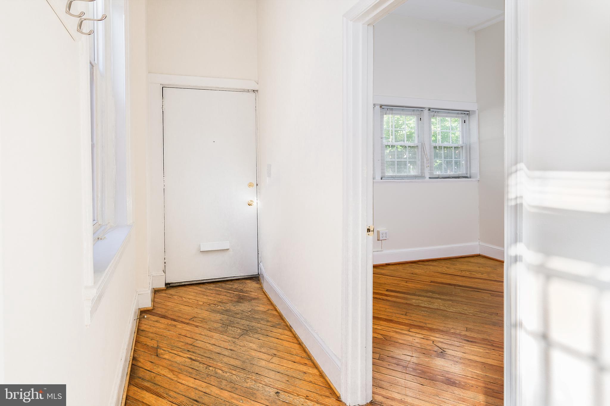 1213 12th Street Northwest, Unit A Washington, DC 20005 - Photo 19 of 25 a view of hallway with wooden floor