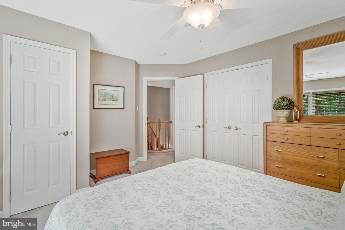 11565 Magnolia Court Issue, MD 20645 - Photo 36 of 68 a bedroom with a bed and a dresser
