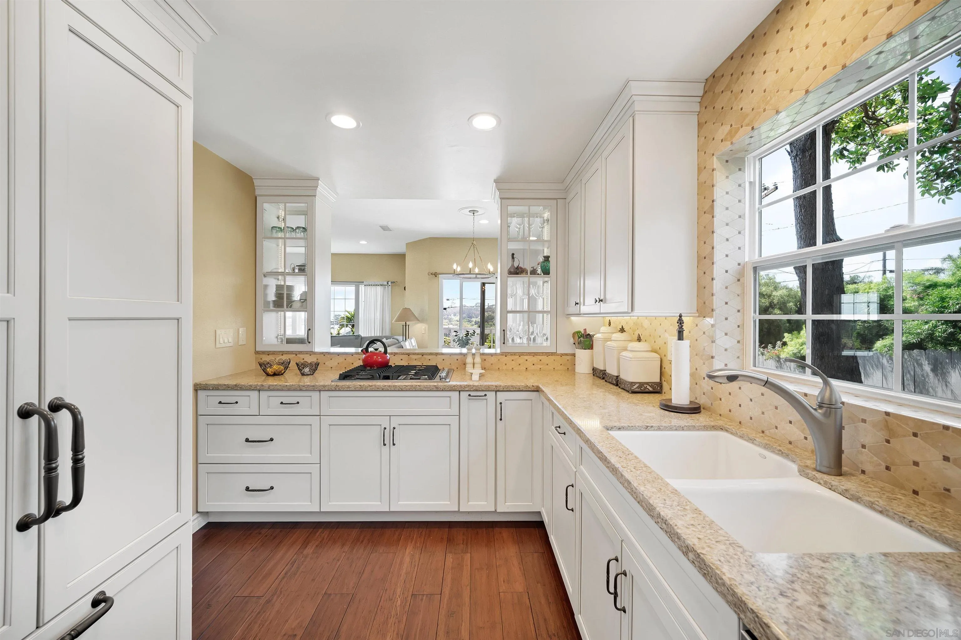 822 Ida Avenue Solana Beach, CA 92075 - Photo 16 of 34 a large kitchen with stainless steel appliances granite countertop a lot of counter space and a sink