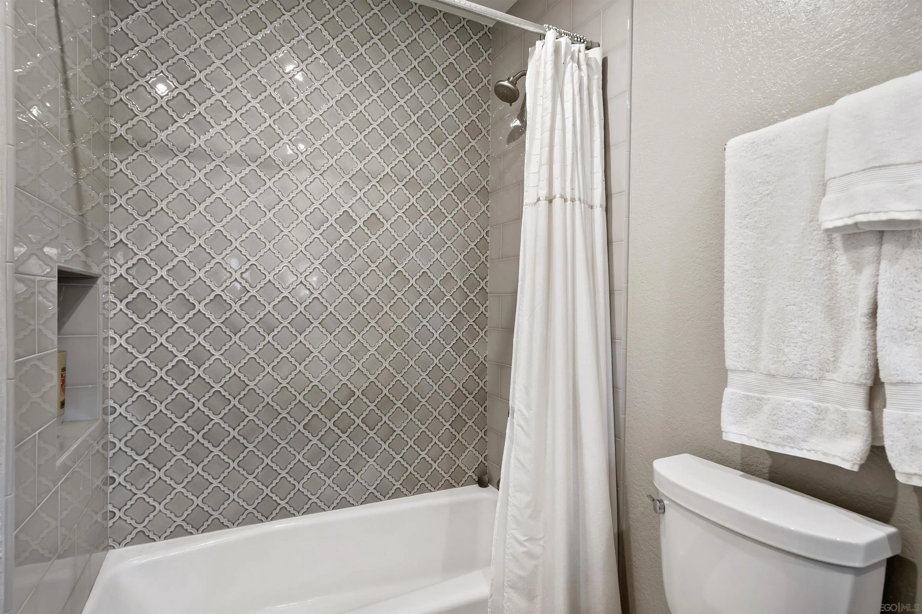 822 Ida Avenue Solana Beach, CA 92075 - Photo 25 of 34 a bathroom with a toilet and a shower