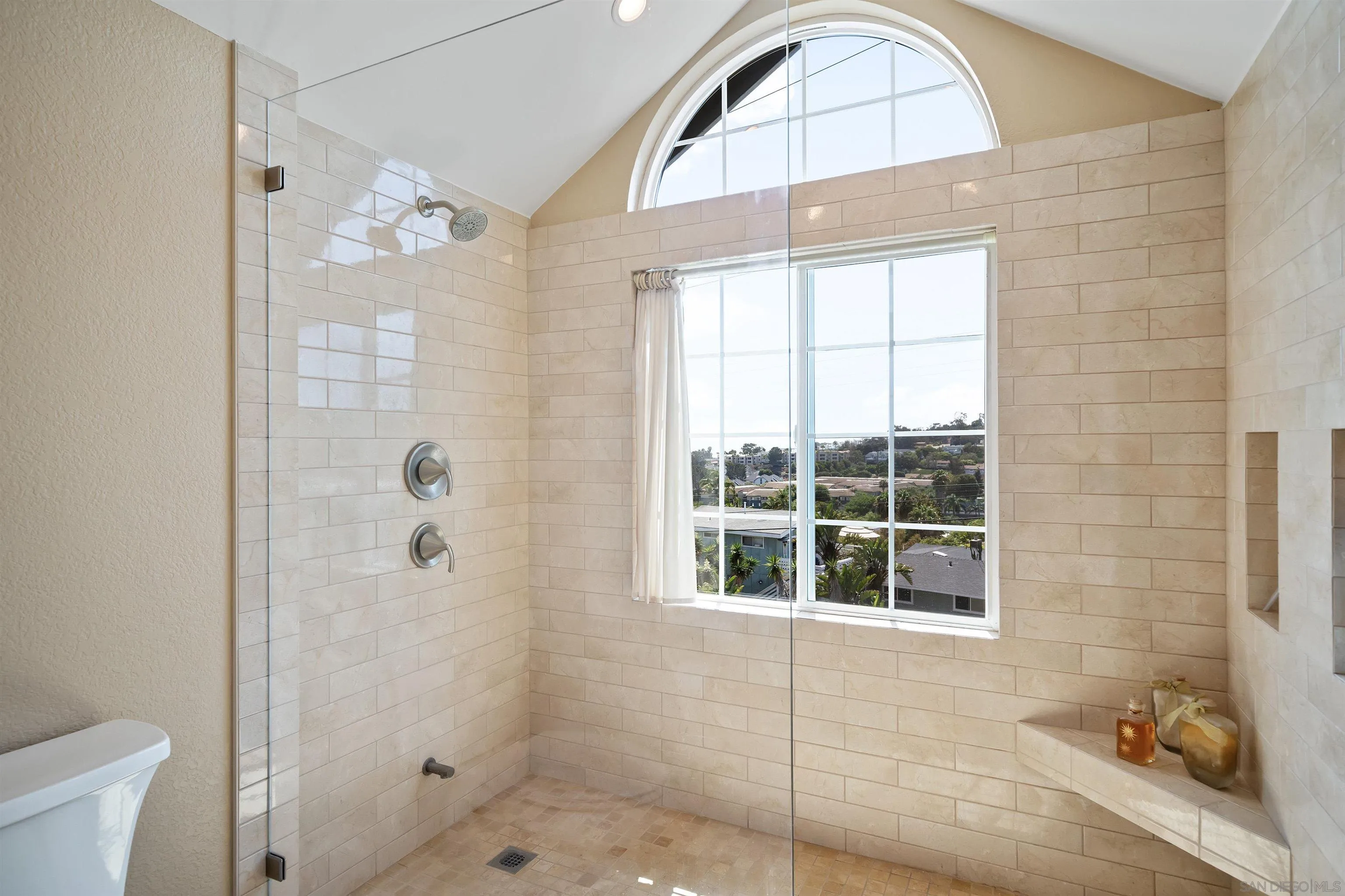 822 Ida Avenue Solana Beach, CA 92075 - Photo 31 of 34 a bathroom with a window and a shower