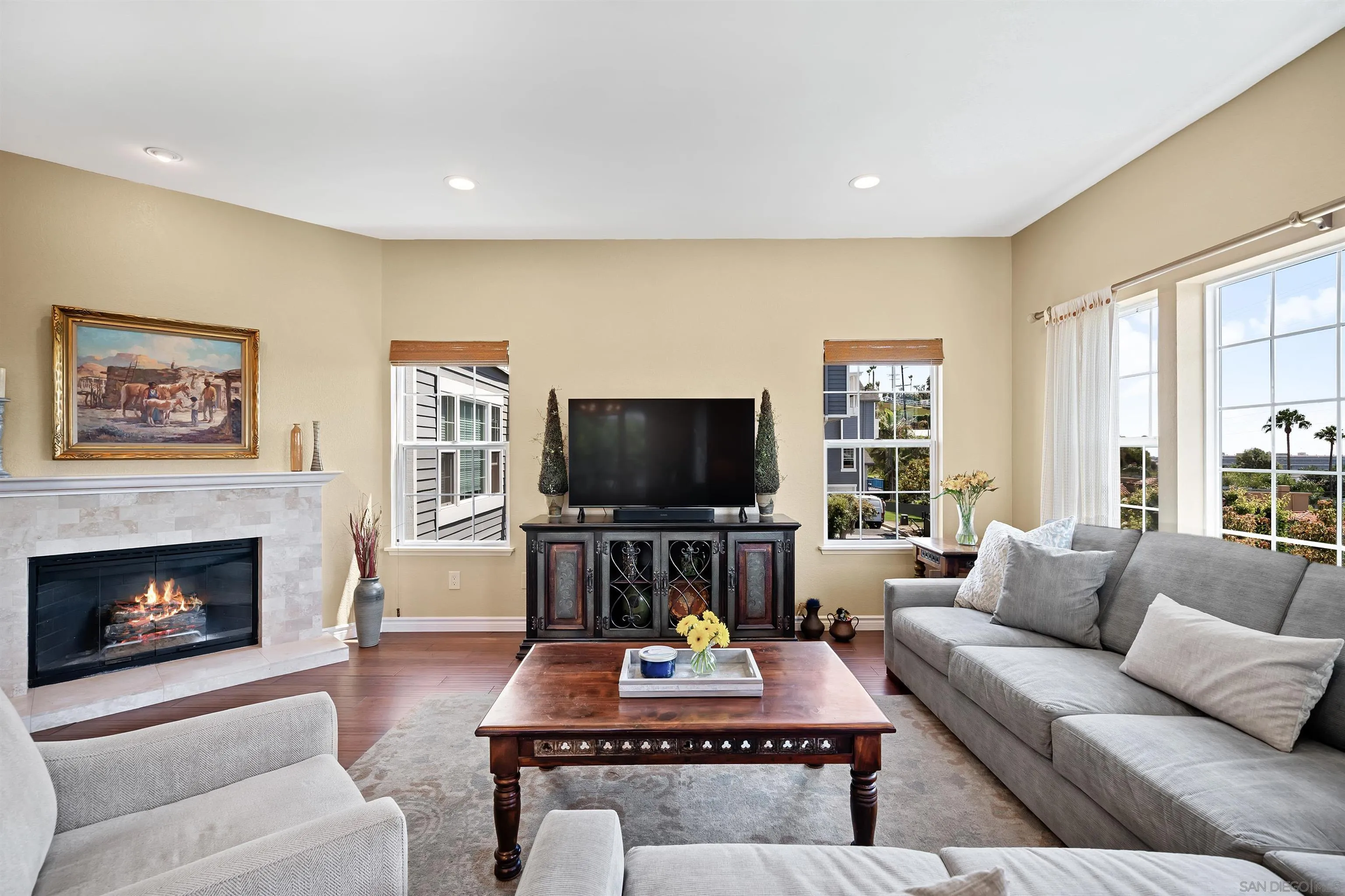 822 Ida Avenue Solana Beach, CA 92075 - Photo 7 of 34 a living room with furniture and a fireplace