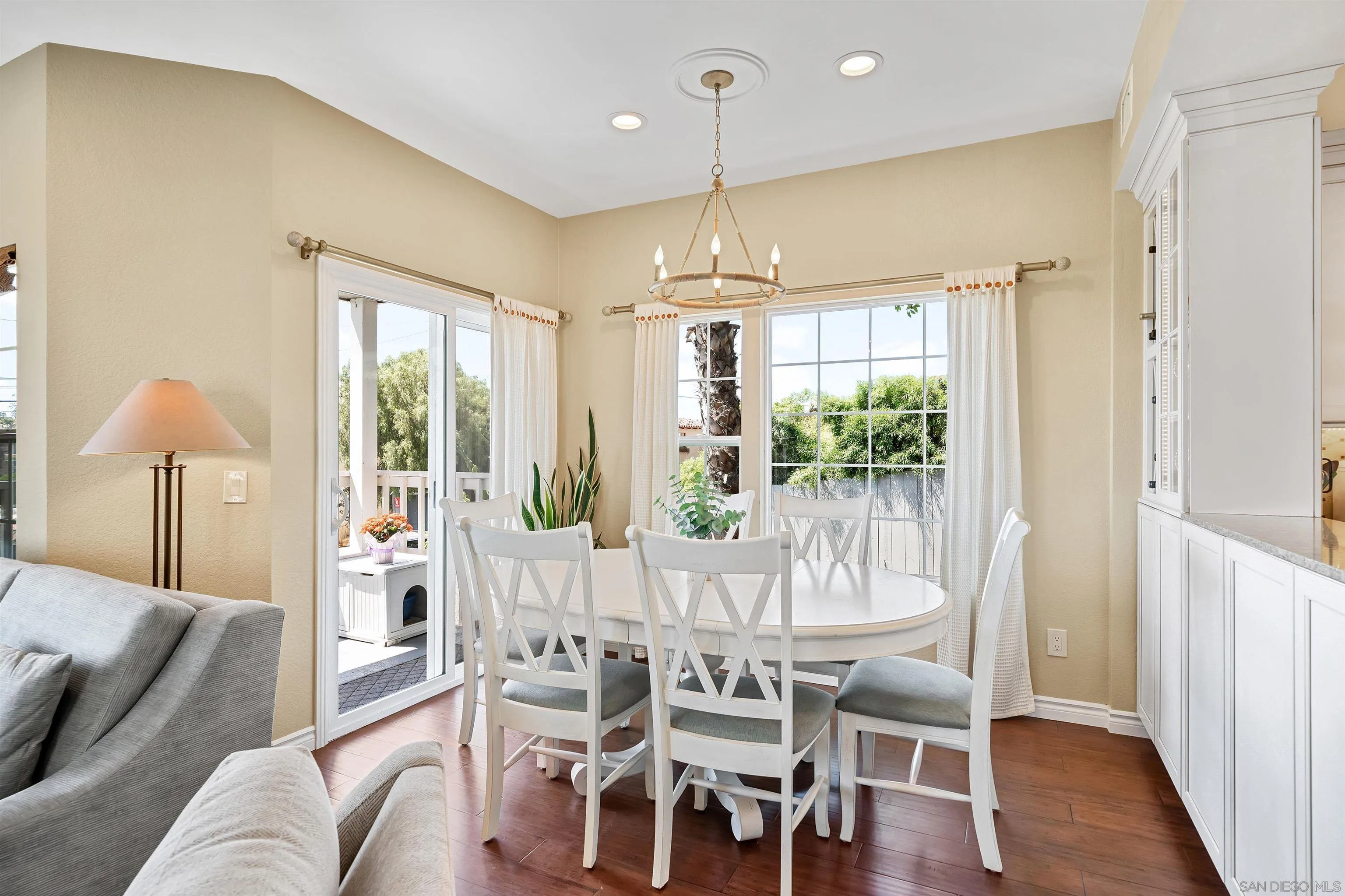 822 Ida Avenue Solana Beach, CA 92075 - Photo 10 of 34 a view of a dining room with furniture window and wooden floor