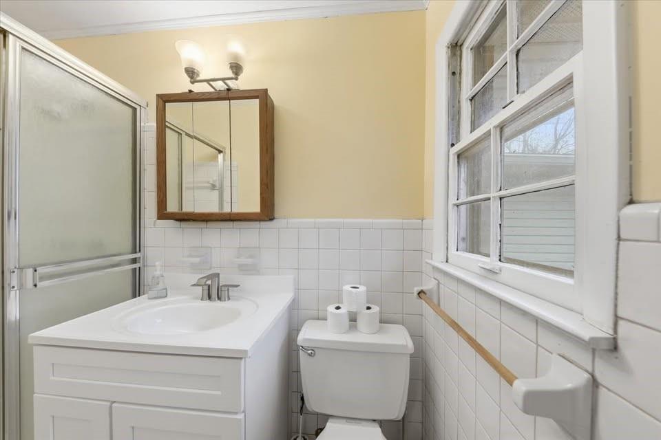 8435 Campbellton Fairburn Road Fairburn, GA 30213 - Photo 13 of 21 a bathroom with a sink toilet and mirror