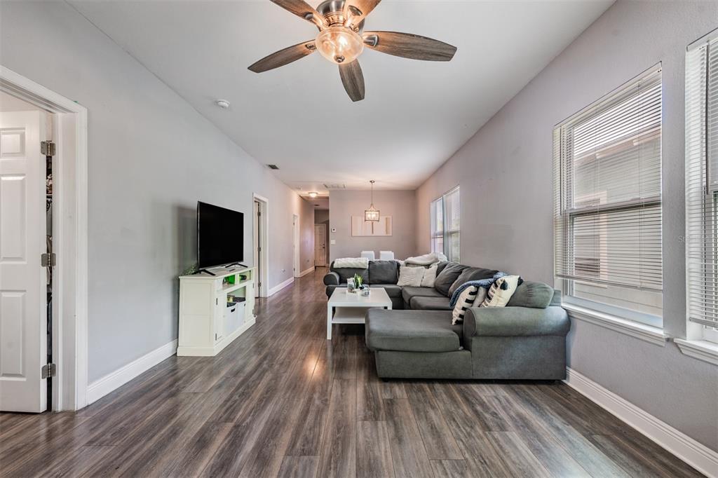 2334 West Spruce Street Tampa, FL 33607 - Photo 6 of 24 a living room with furniture and a flat screen tv