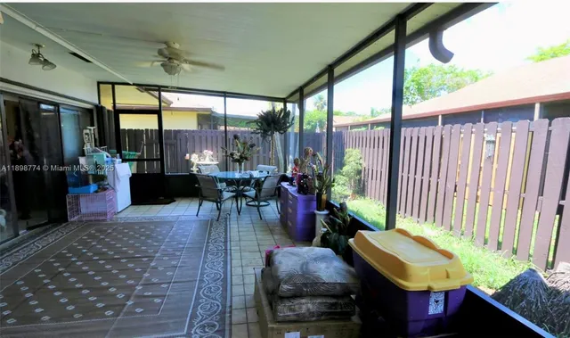 a view of an outdoor dining space with furniture