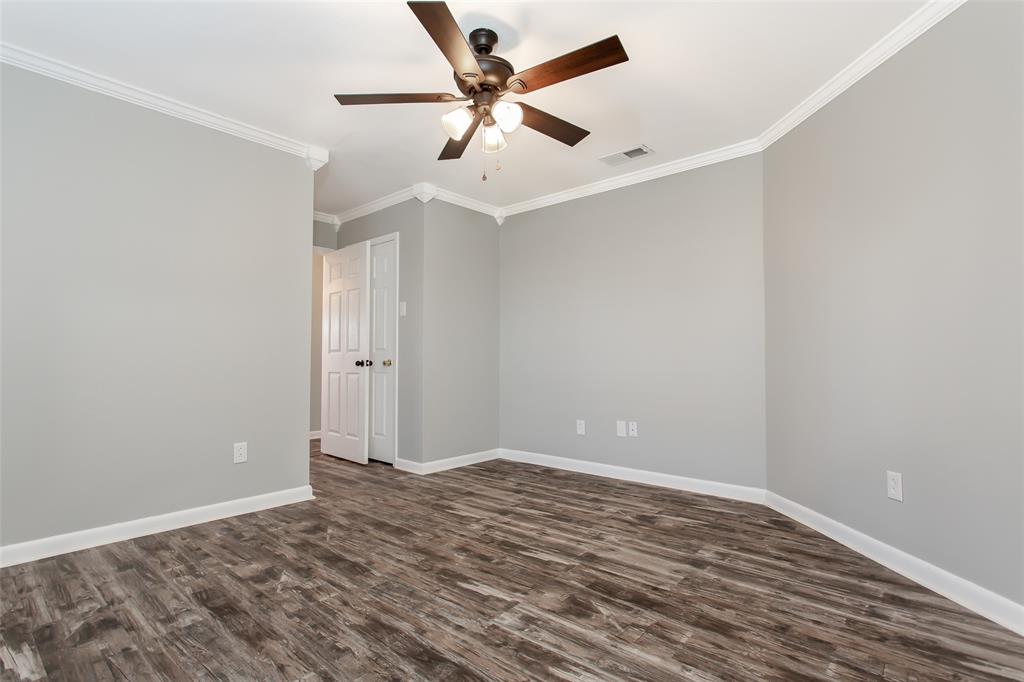 712 Billups Street Van Alstyne, TX 75495 - Photo 34 of 38 wooden floor in an empty room