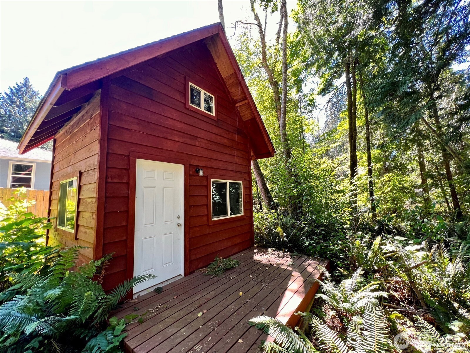 158 Tyee Drive Point Roberts, WA 98281 - Photo 2 of 10 a view of a house with a small yard