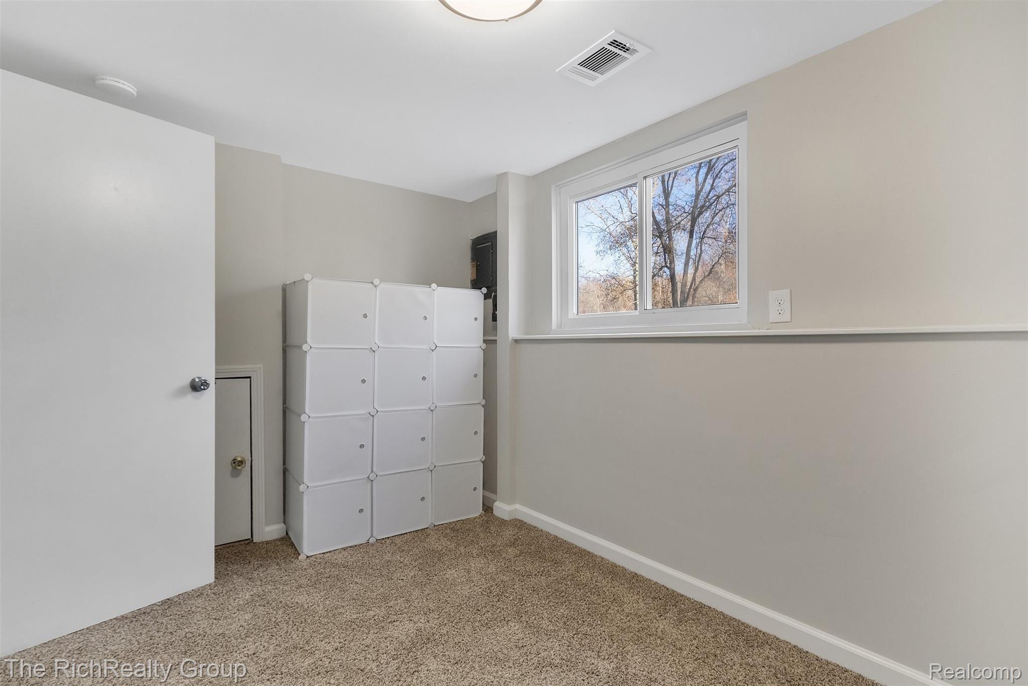 22701 Dickinson Road New Boston, MI 48164 - Photo 23 of 43 24-22701 Dickinson Rd-WindowStill-R.jpg