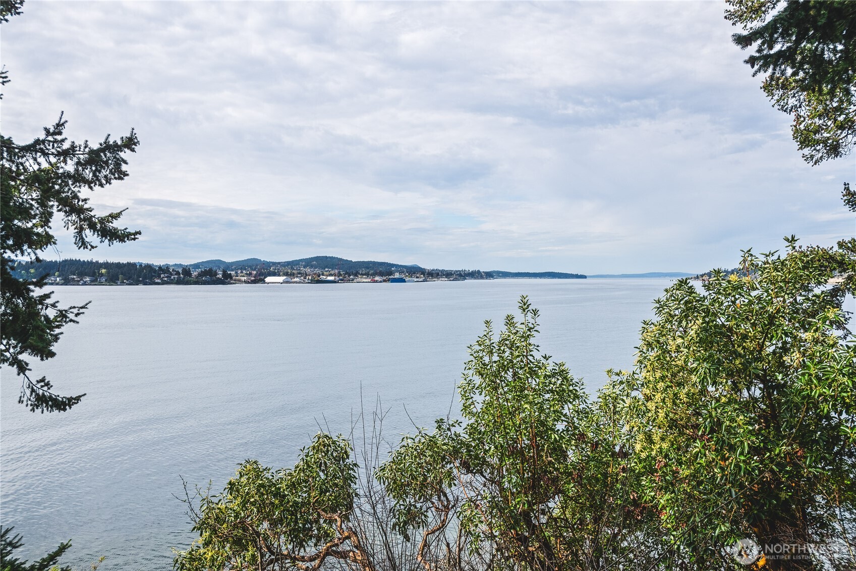 7616 Cypress Way Anacortes, WA 98221 - Photo 1 of 35 a view of a lake with outdoor space