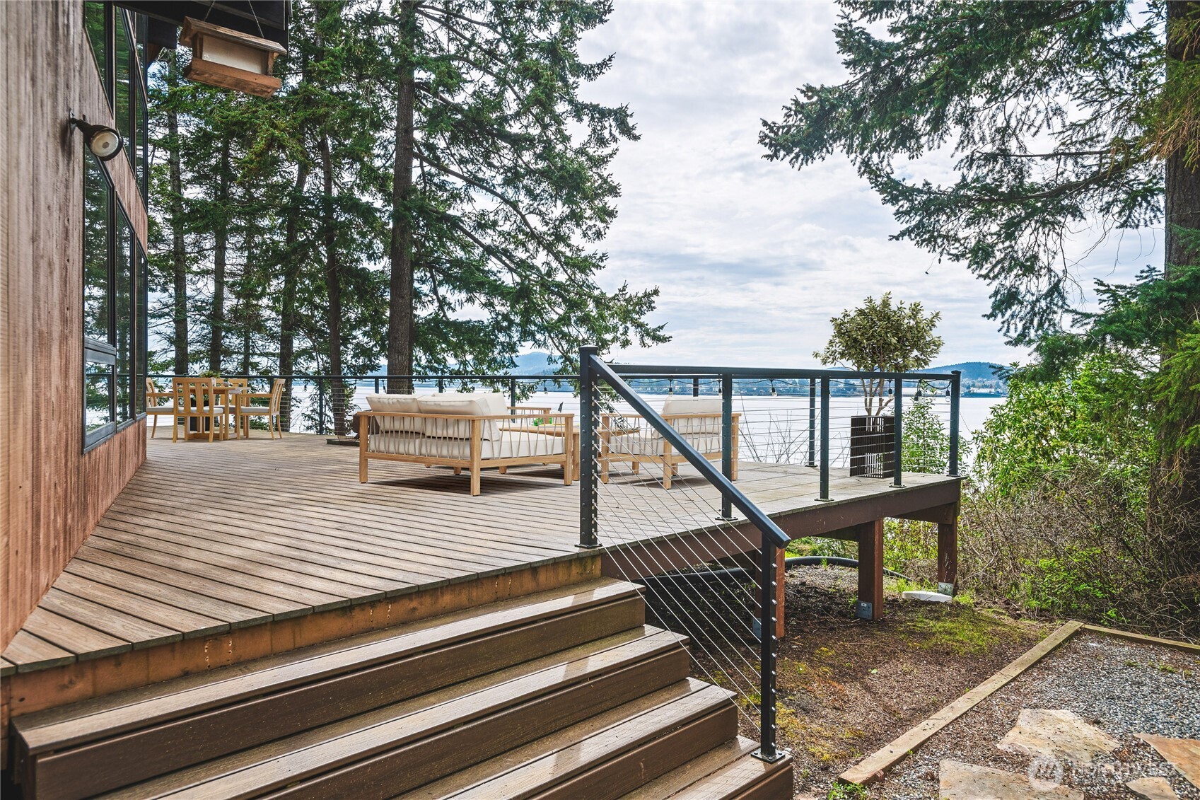 7616 Cypress Way Anacortes, WA 98221 - Photo 7 of 35 a view of outdoor space deck and tree