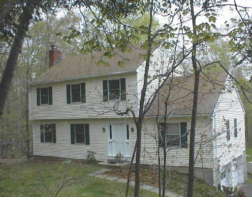 410 Old Sib Road Ridgefield, CT 06877 - Photo 1 of 1 a front view of a house with yard