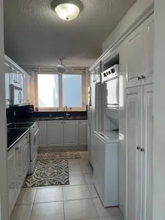 a view of an empty room and a window