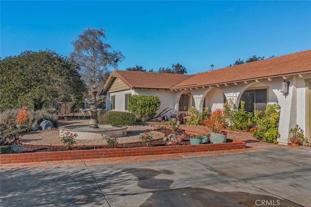 front view of a house with a patio