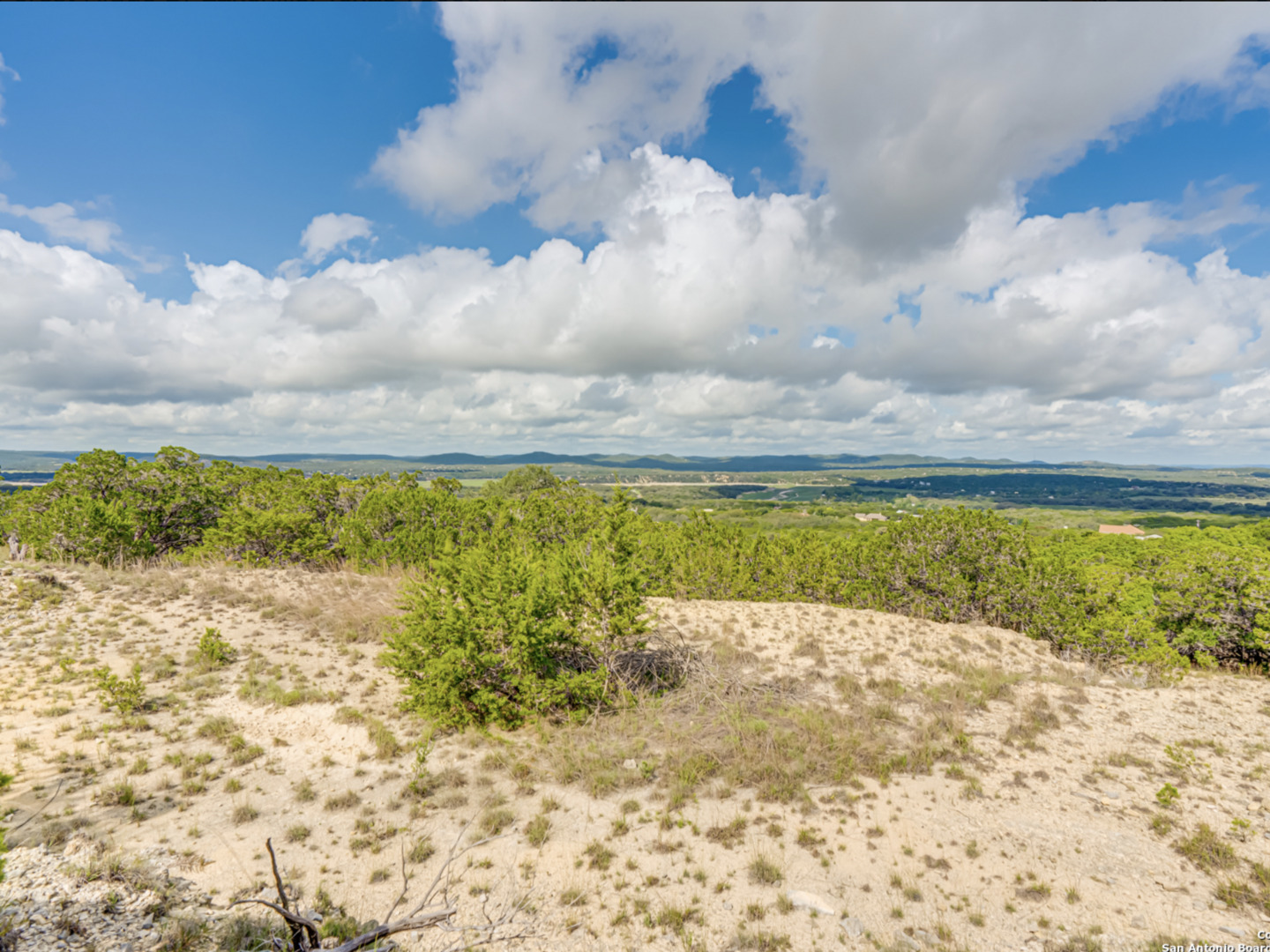259 Forest Ridge Drive Lakehills, TX 78063 - Photo 13 of 30 a view of a swimming pool and a yard