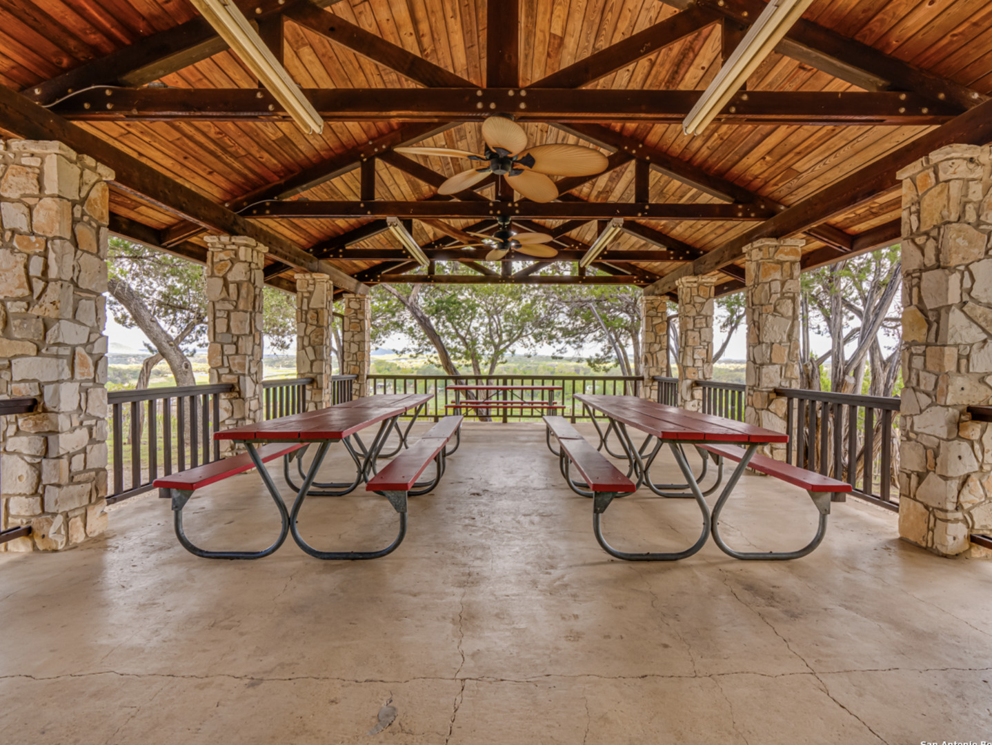 259 Forest Ridge Drive Lakehills, TX 78063 - Photo 21 of 30 a view of porch with chairs and table in a patio