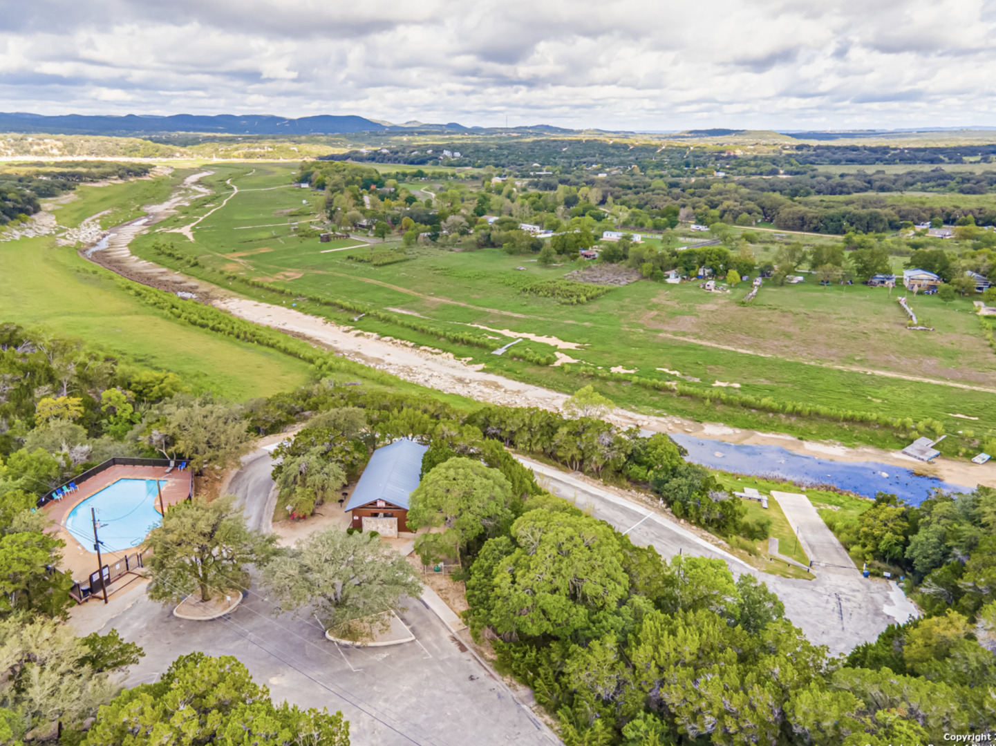259 Forest Ridge Drive Lakehills, TX 78063 - Photo 30 of 30 a view of an outdoor space with a lake view