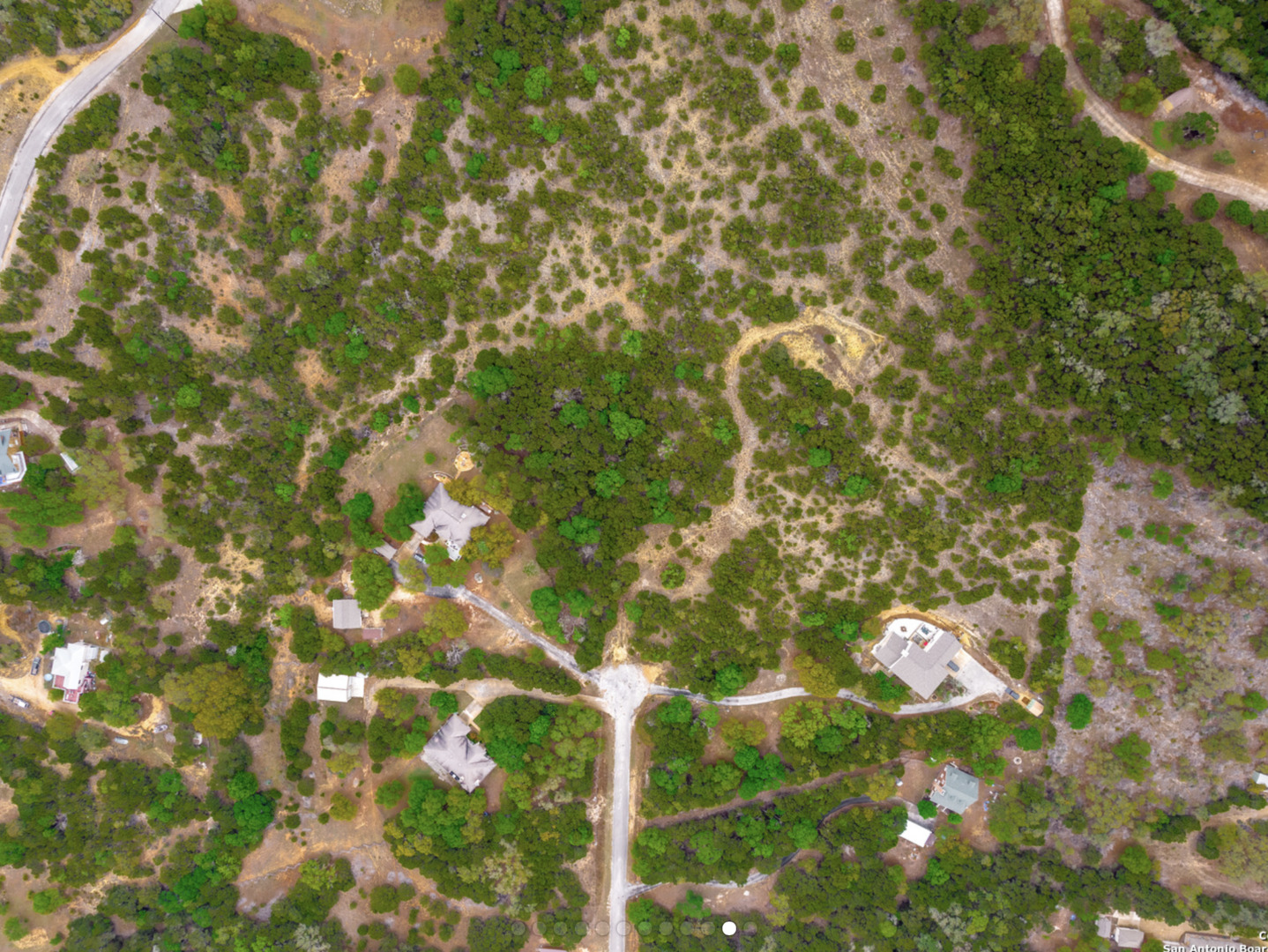259 Forest Ridge Drive Lakehills, TX 78063 - Photo 10 of 30 a backyard of a house