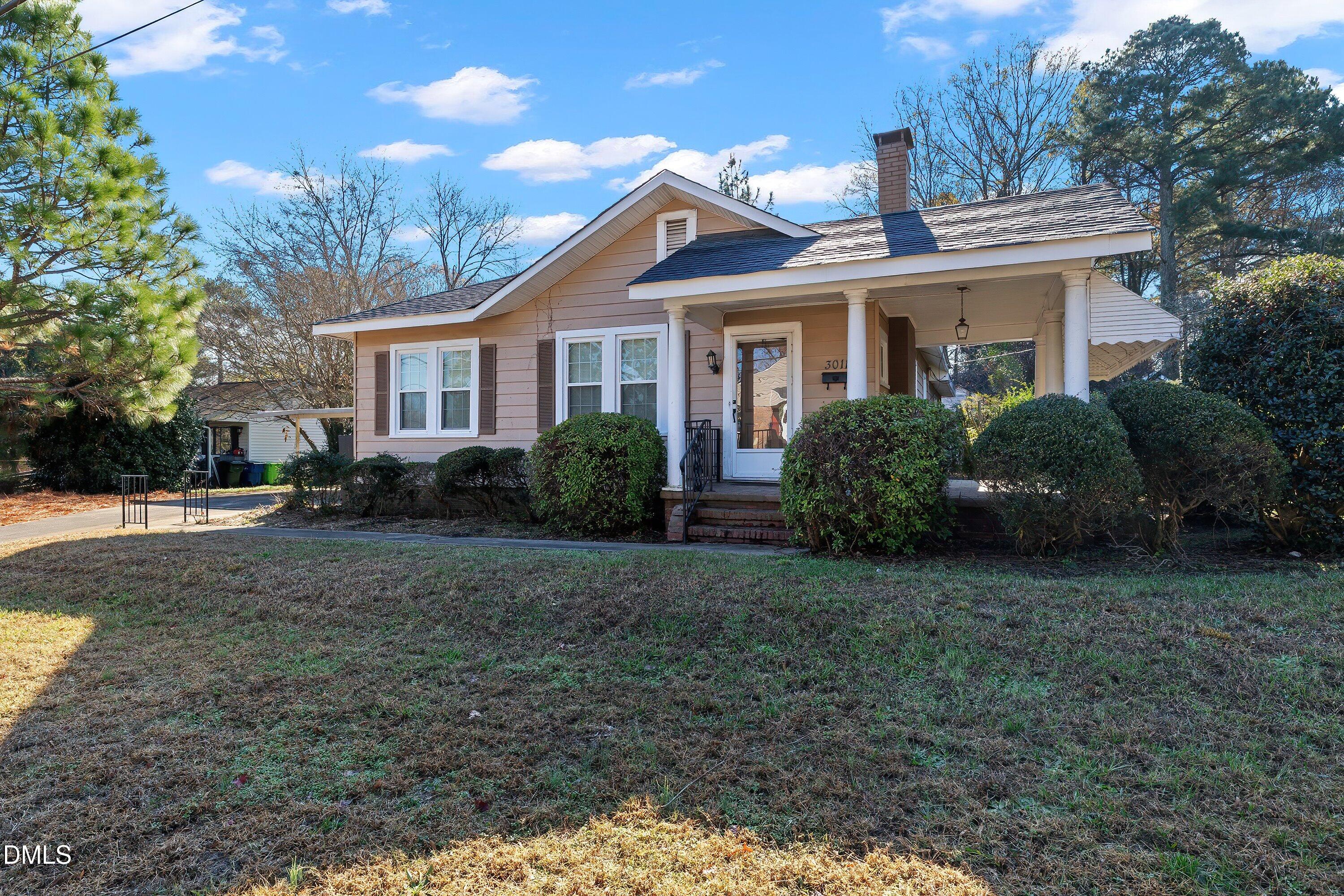 3010 Burrell Place Raleigh, NC 27607 - Photo 11 of 46 a front view of a house with garden