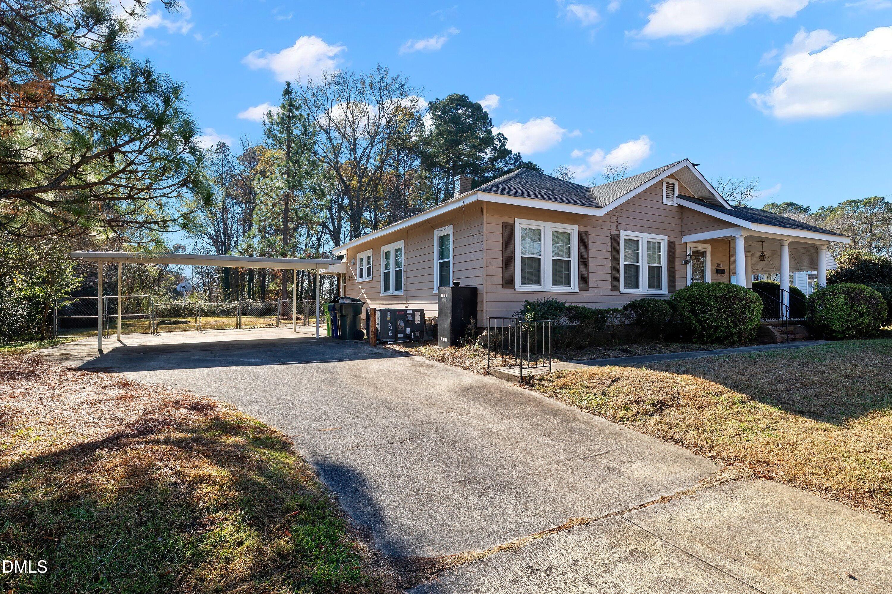 3010 Burrell Place Raleigh, NC 27607 - Photo 12 of 46 a front view of a house with a yard