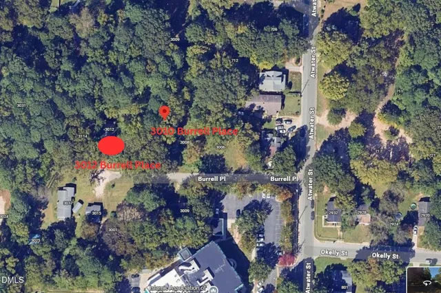 a white refrigerator with a next to a window