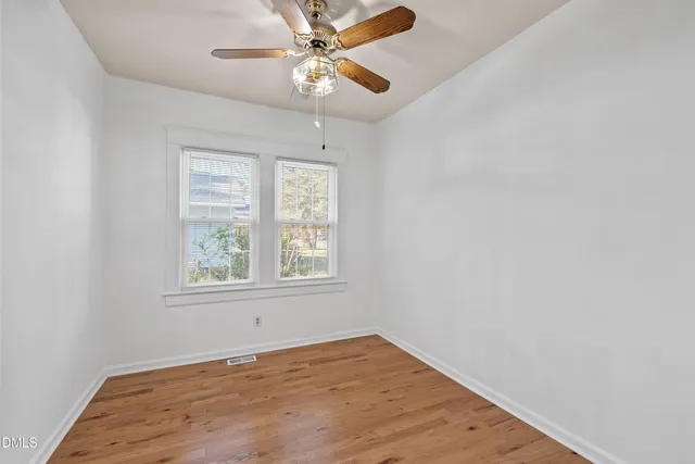a bathroom with a sink a mirror and shower