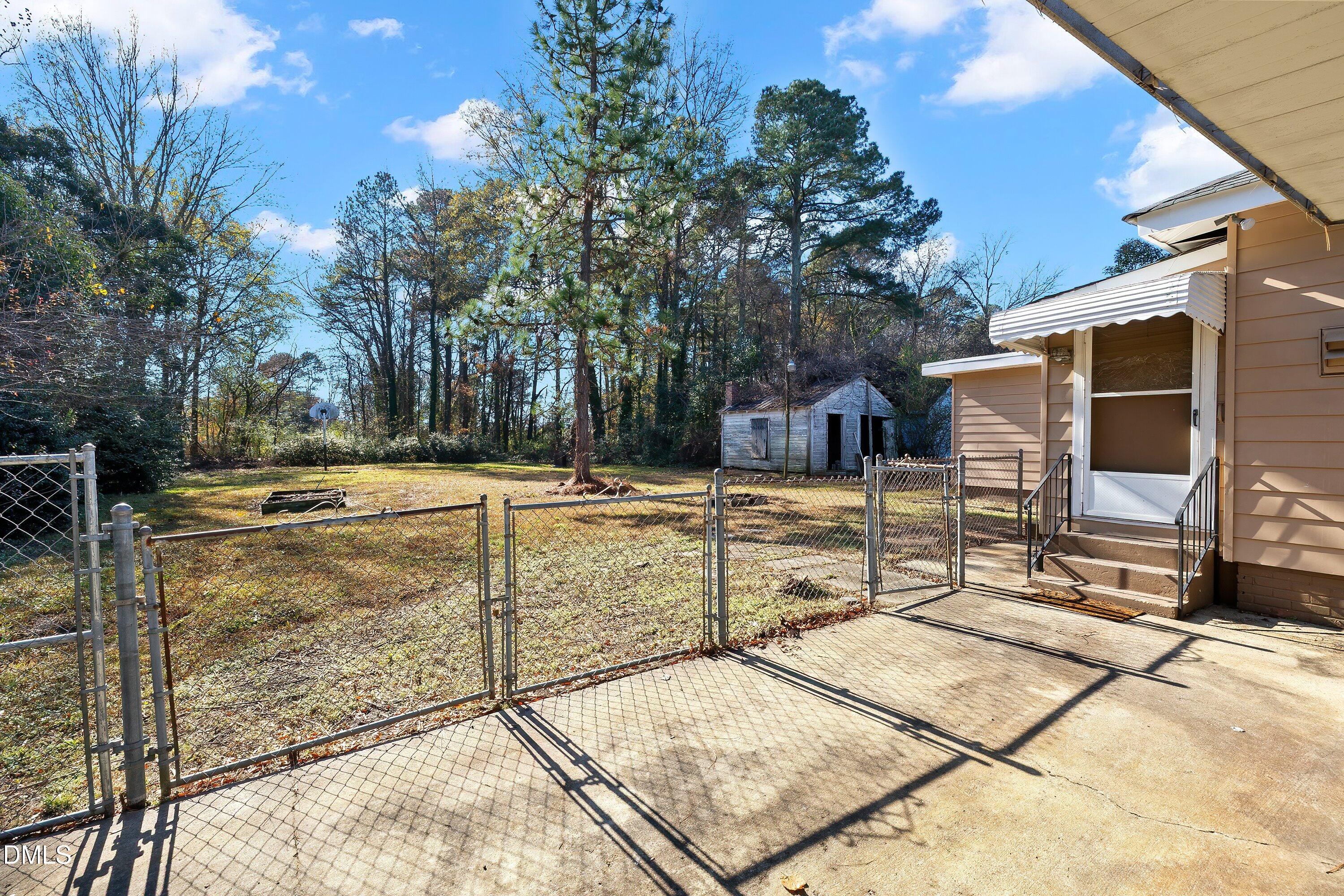 3010 Burrell Place Raleigh, NC 27607 - Photo 41 of 46 a view of a yard with car parked