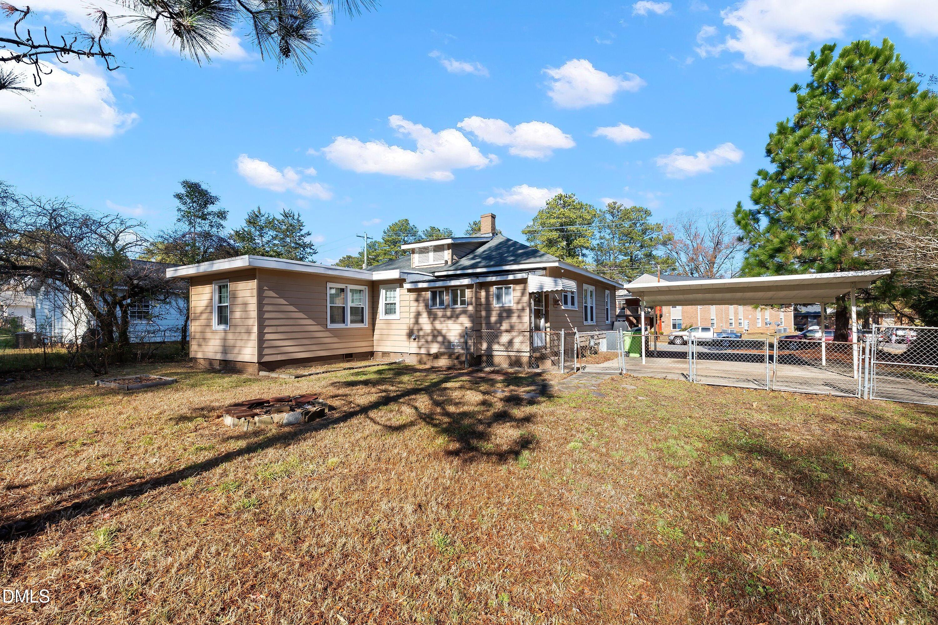 3010 Burrell Place Raleigh, NC 27607 - Photo 44 of 46 a view of a house with backyard and sitting area